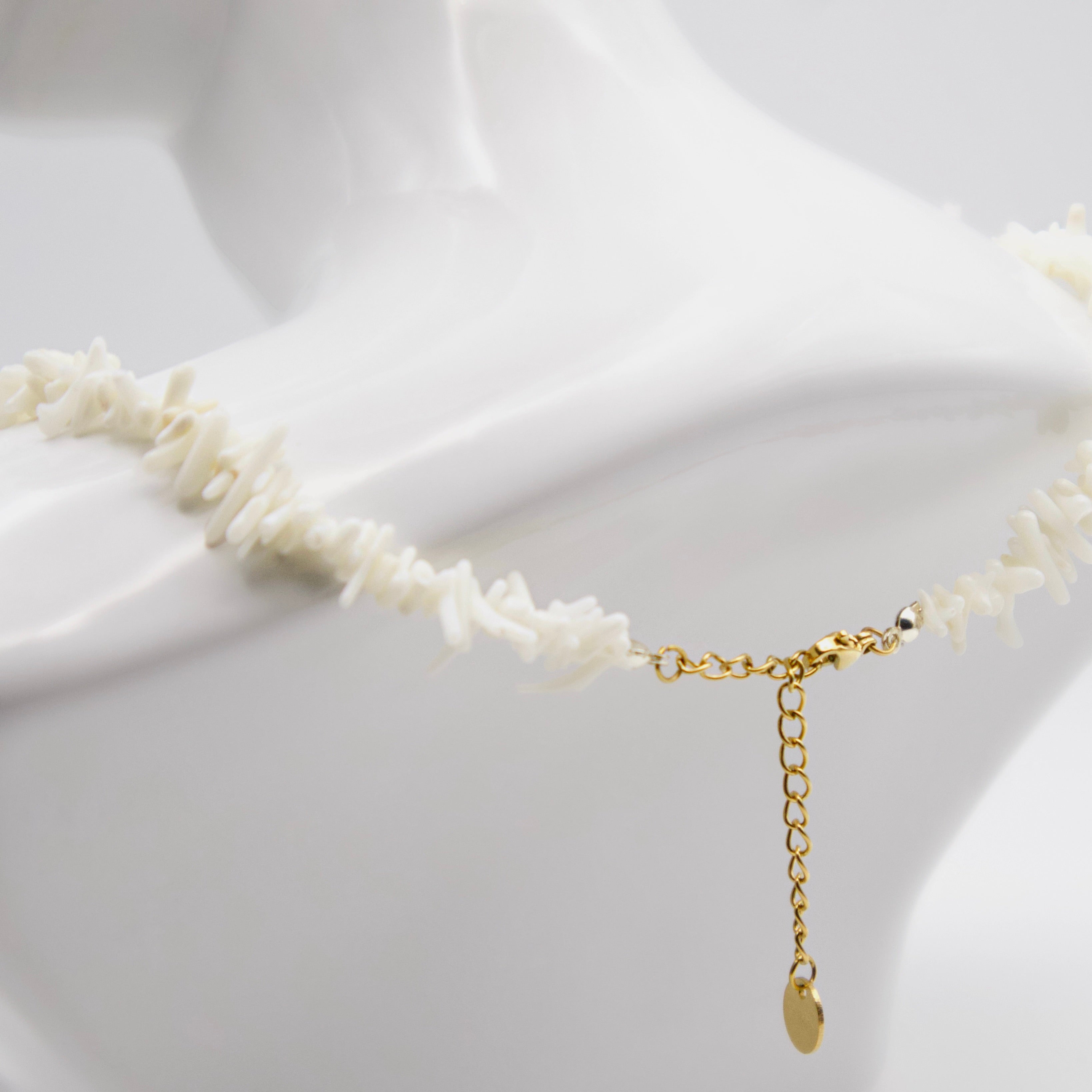 Stainless steel chain with white coral pendant. Handmade necklace.